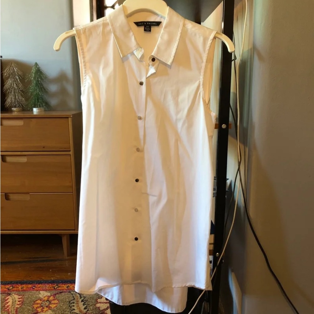 White sleeveless blouse